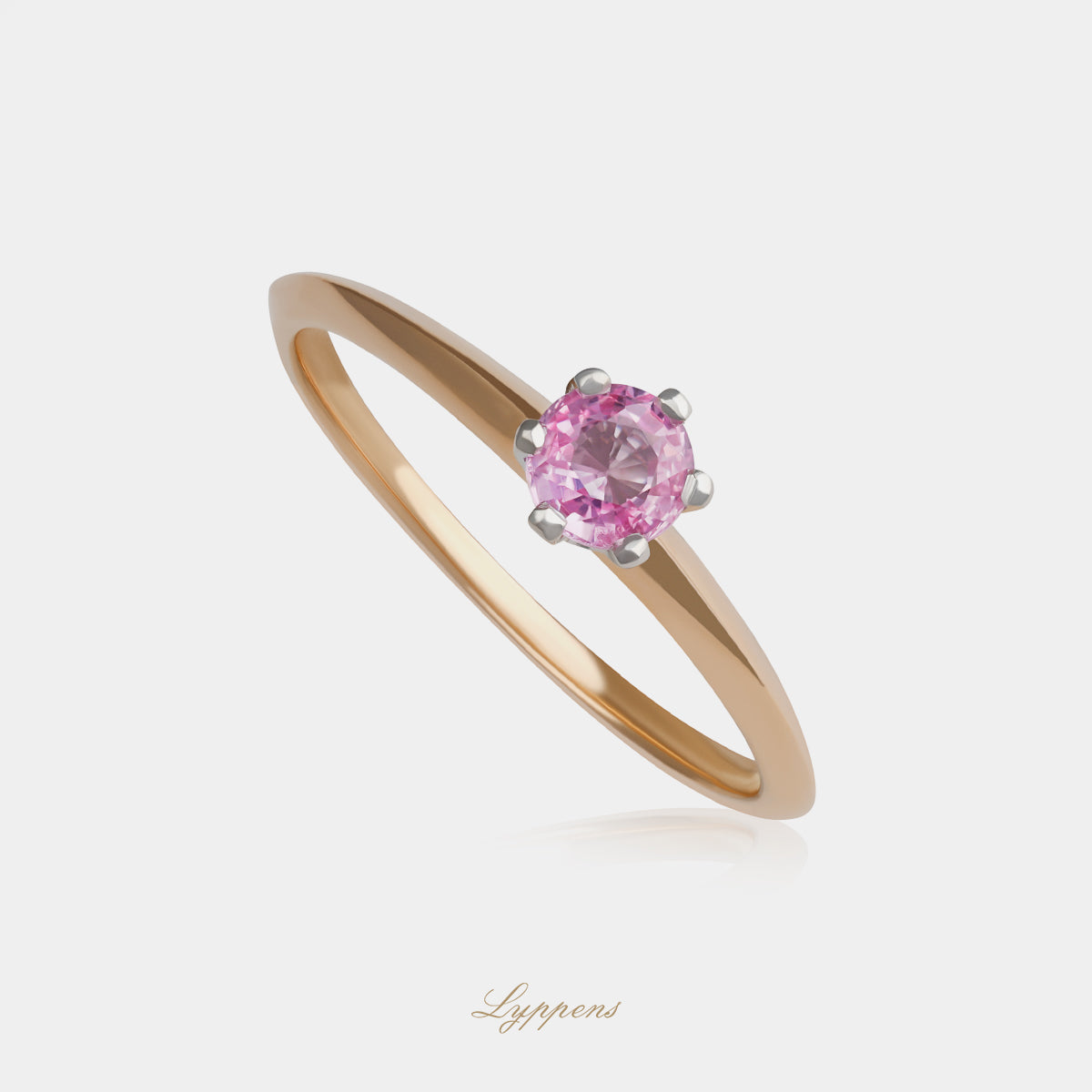 Rose gold solitaire ring with pink sapphire