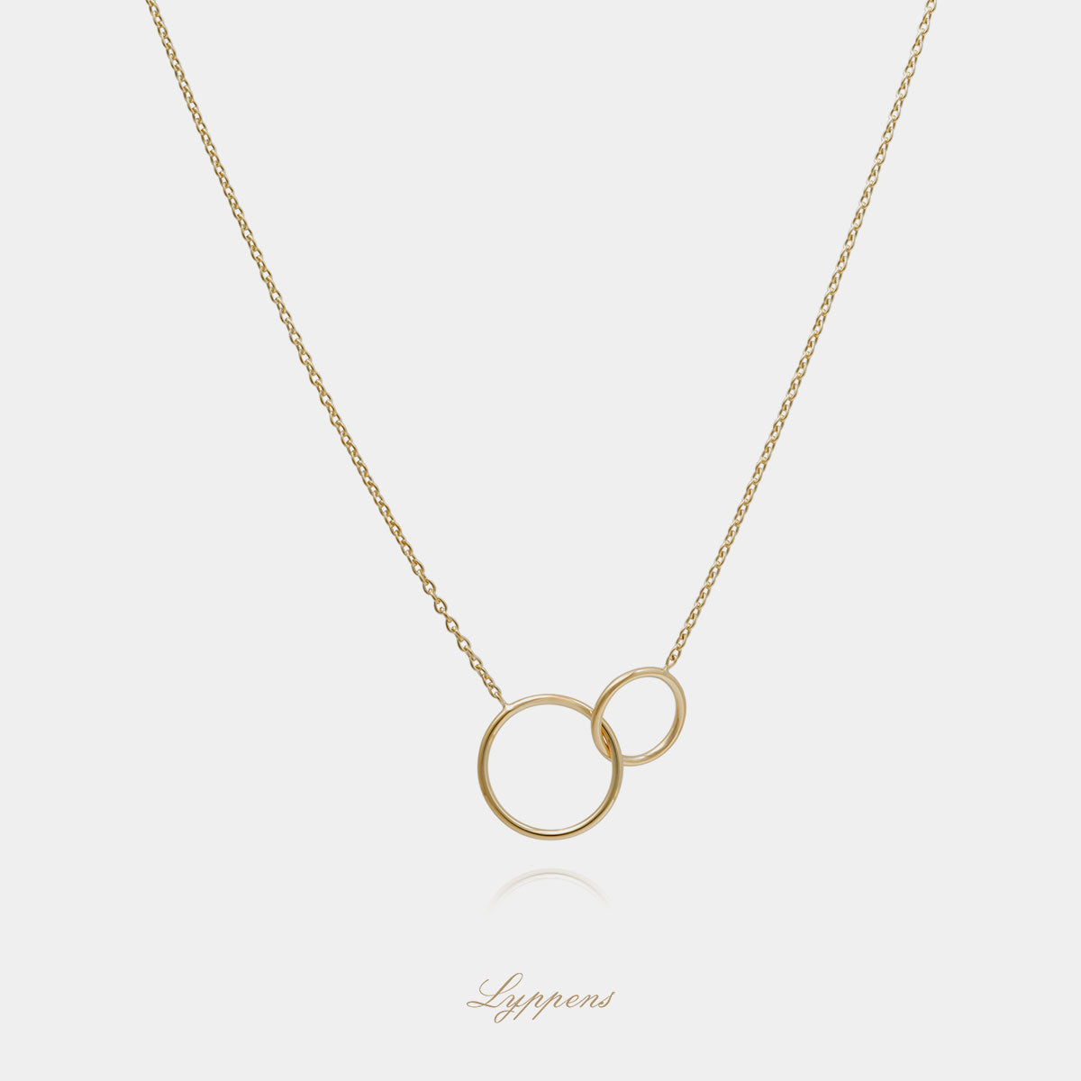 Yellow gold necklace with golden rings