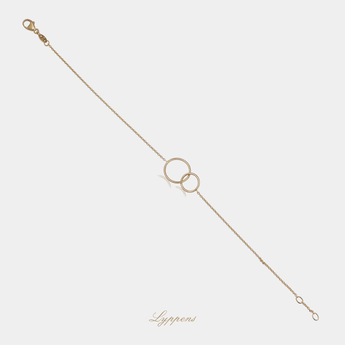 Geelgouden anker schakelarmband gedecoreerd met twee ringen.
