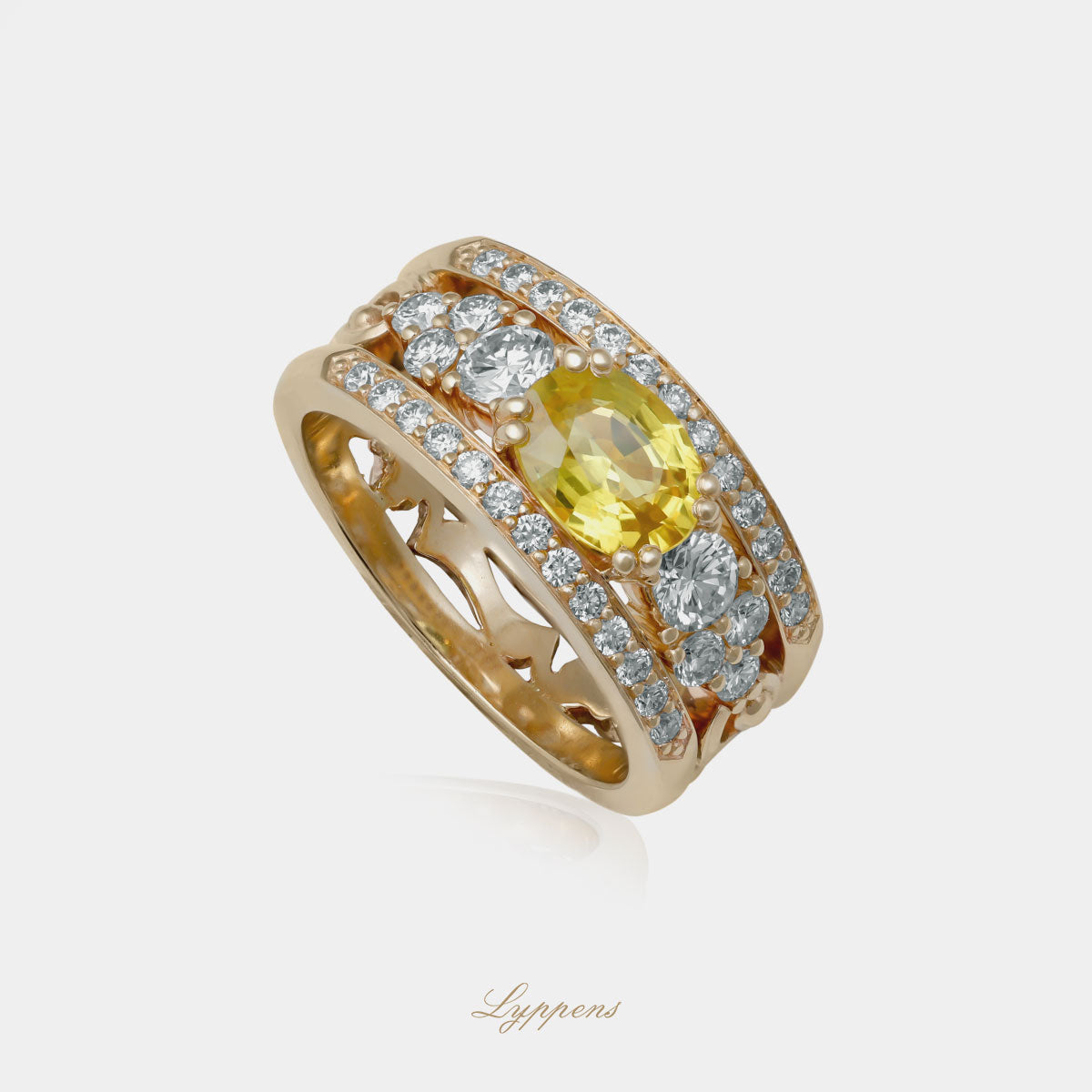 Geelgouden bandring gezet met een ovale gele saffier omlijst door briljant geslepen diamant.