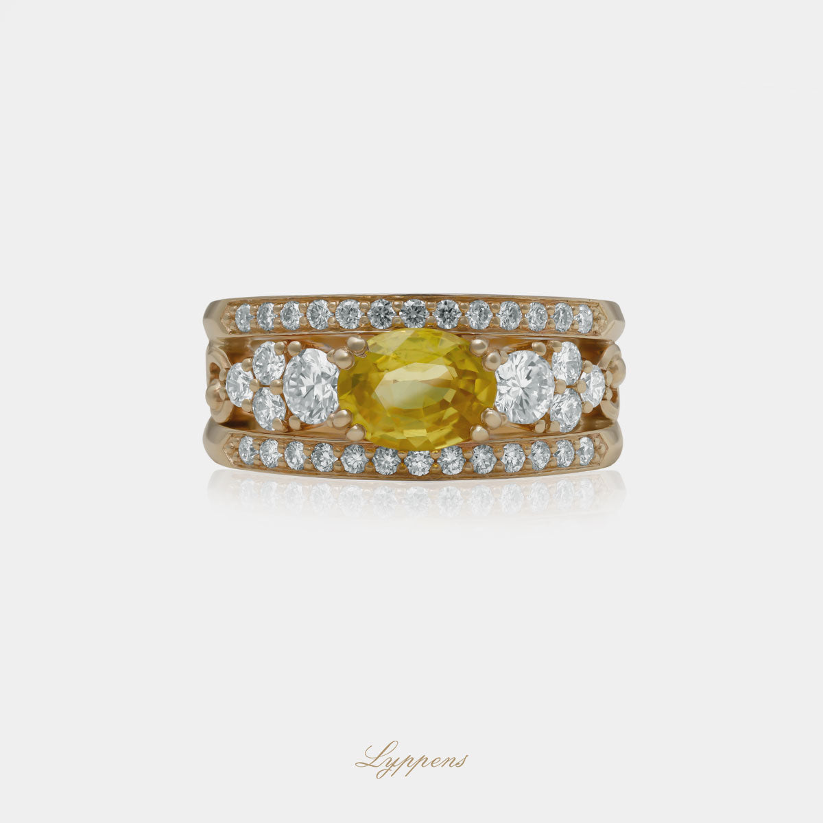 Geelgouden bandring gezet met een ovale gele saffier omlijst door briljant geslepen diamant.