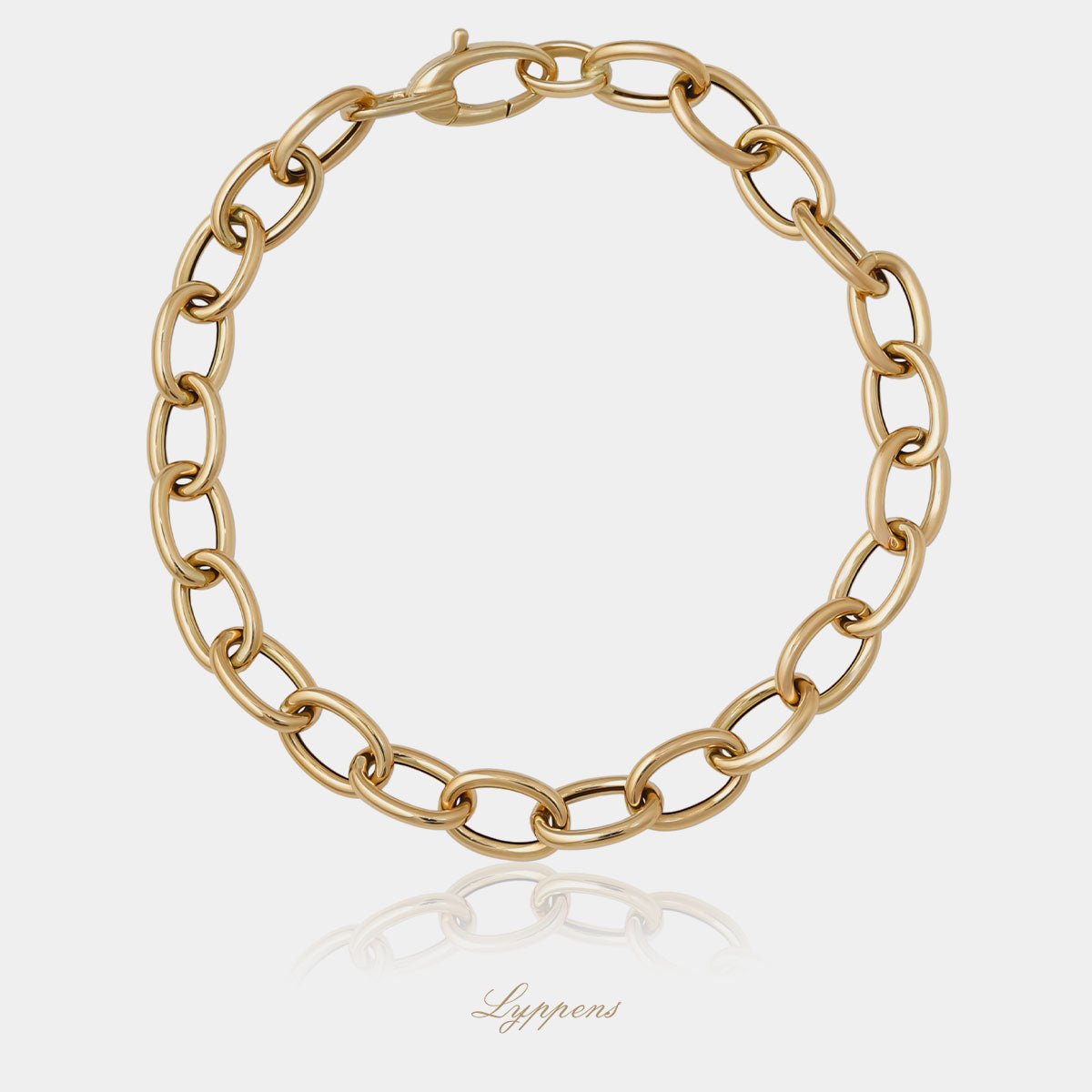 Geelgouden fantasie schakelarmband opgebouwd uit ovale schakels.