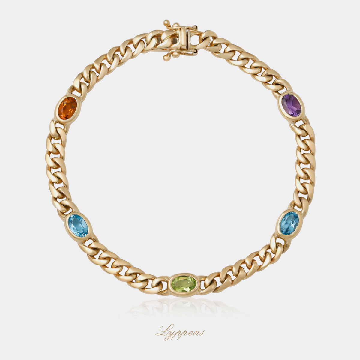 Geelgouden gourmet schakelarmband gezet met verschillende edelstenen.