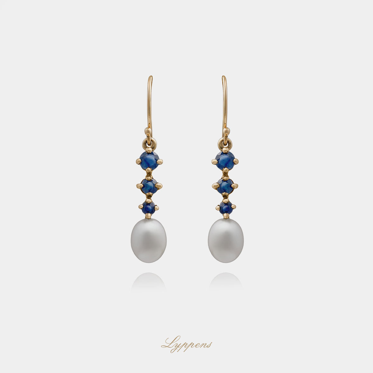 Geelgouden oorbellen met saffier en parels