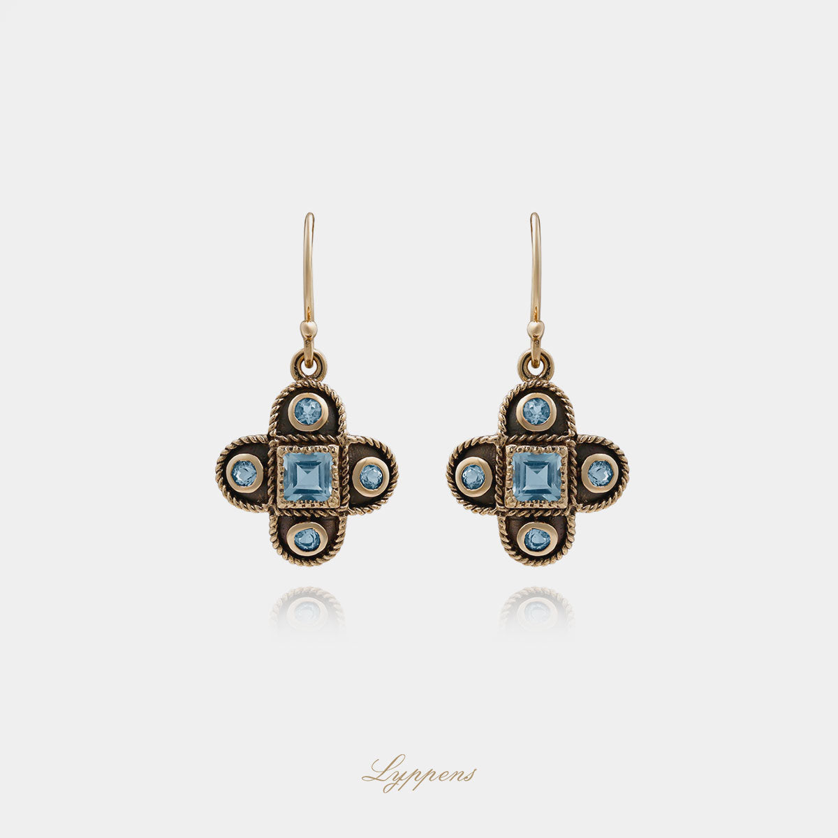 Yellow gold earrings with topaz