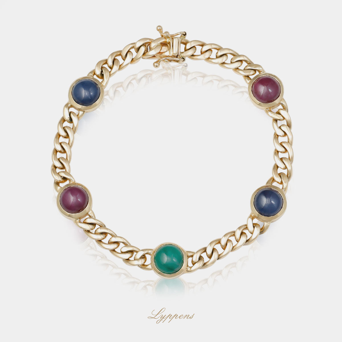 Geelgouden schakelarmband met saffier, smaragd en robijn