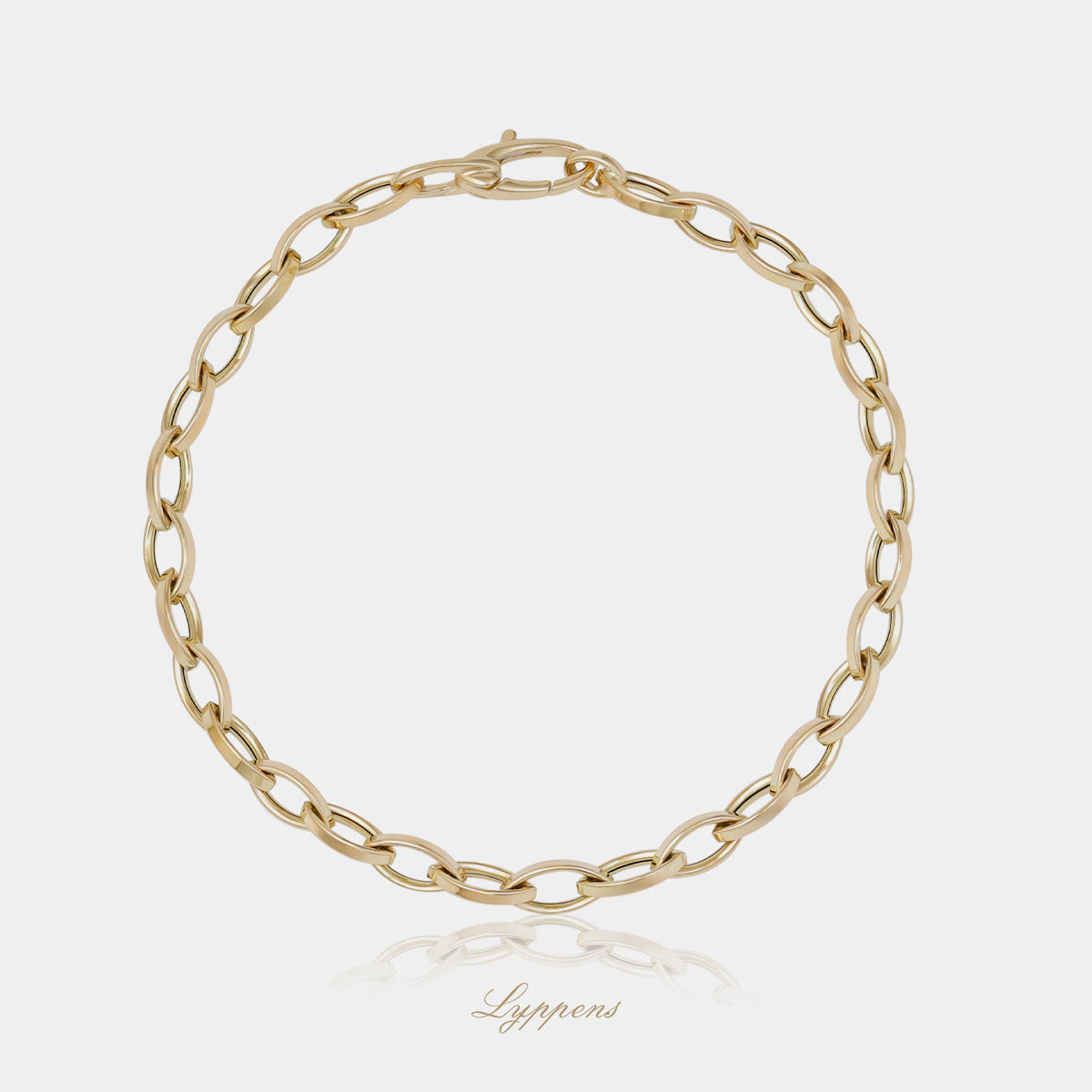 Geelgouden fantasie schakelarmband