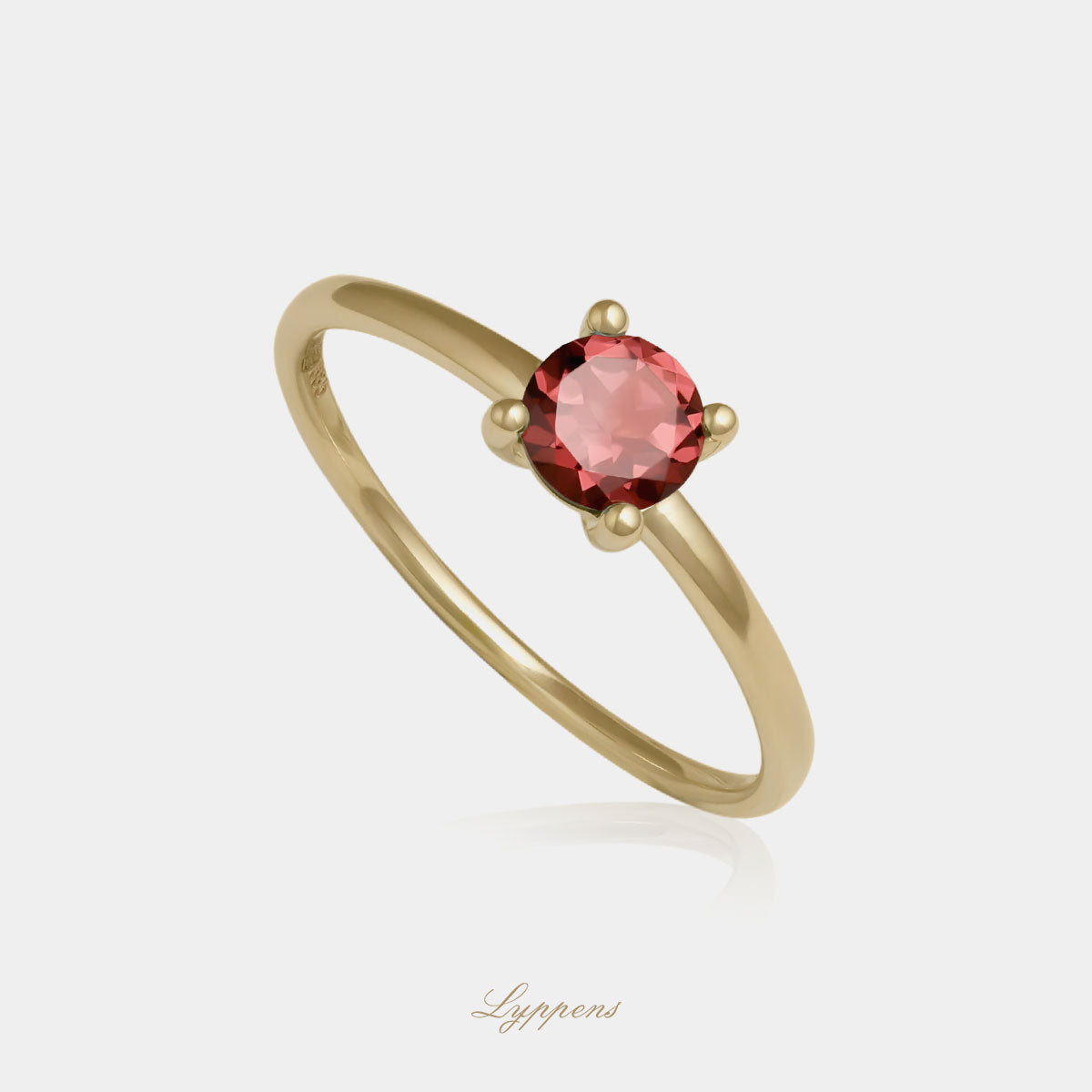Yellow gold solitaire ring with rhodolite