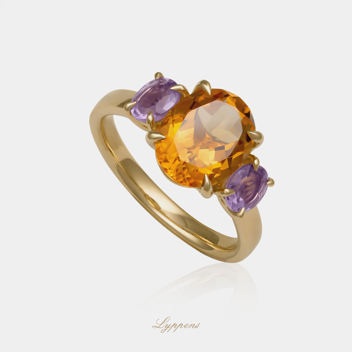 Yellow gold three stone ring with citrine and amethyst