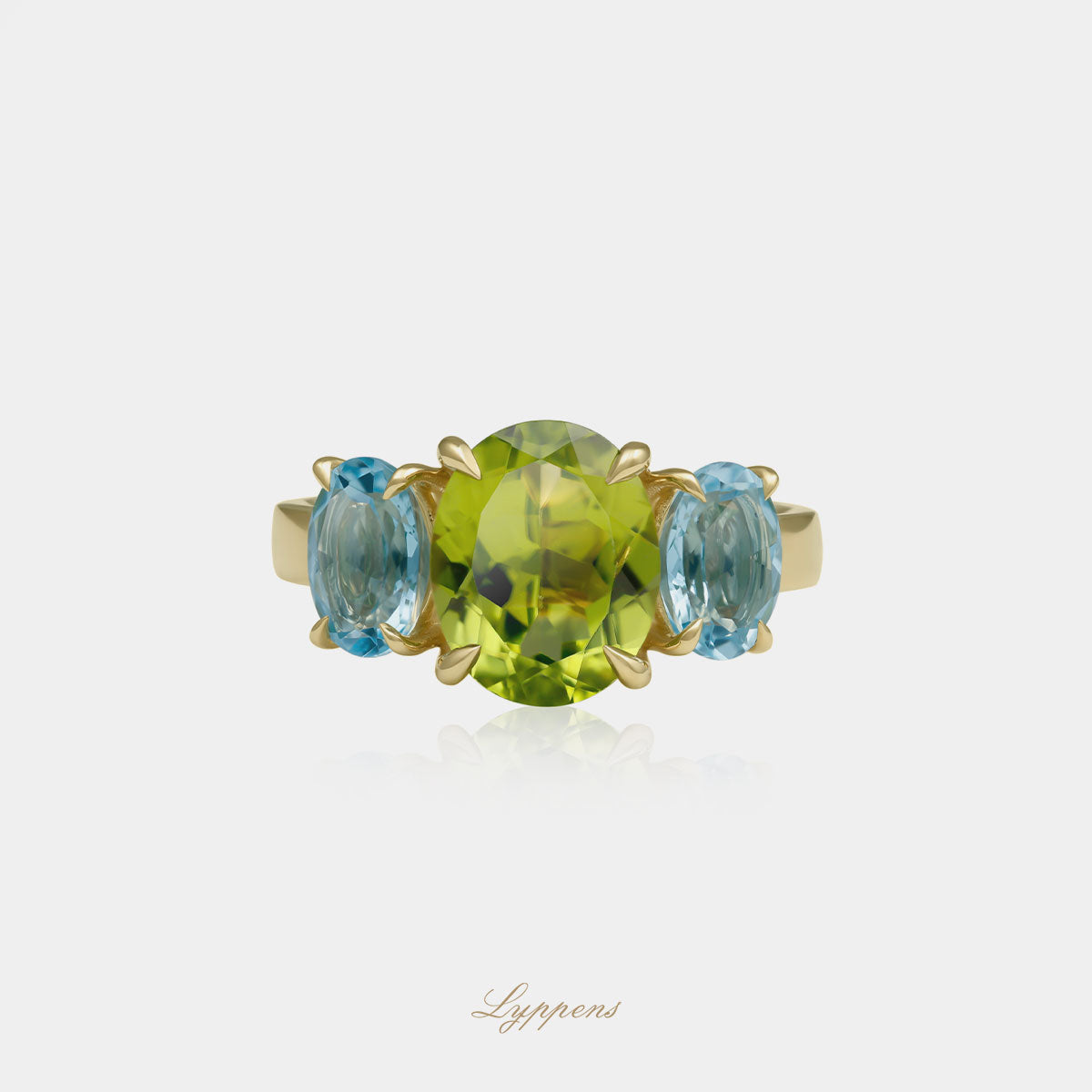 Yellow gold three stone ring with peridot and topaz