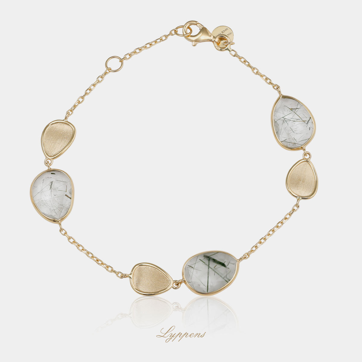 14kt geelgouden schakelarmband gezet met rutielkwarts