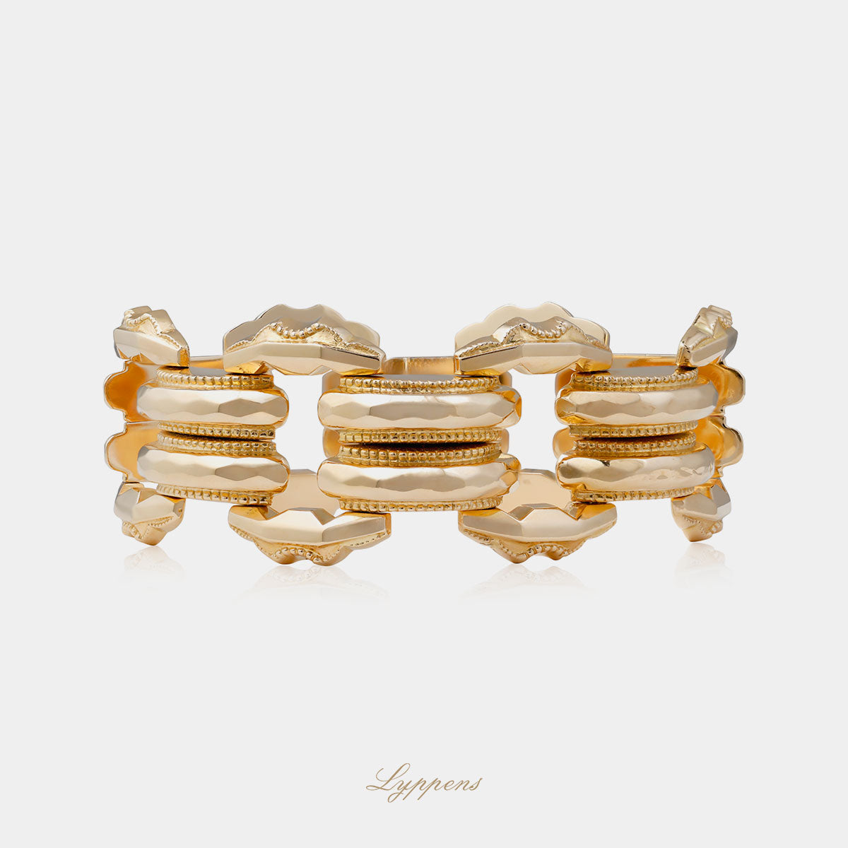 Roségouden vintage jaren ‘50 schakelarmband opgebouwd uit fantasie vormige schakels