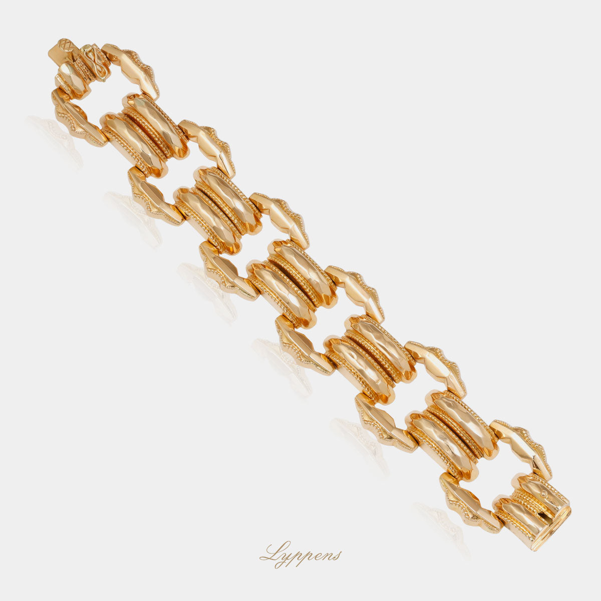 Roségouden vintage jaren ‘50 schakelarmband opgebouwd uit fantasie vormige schakels