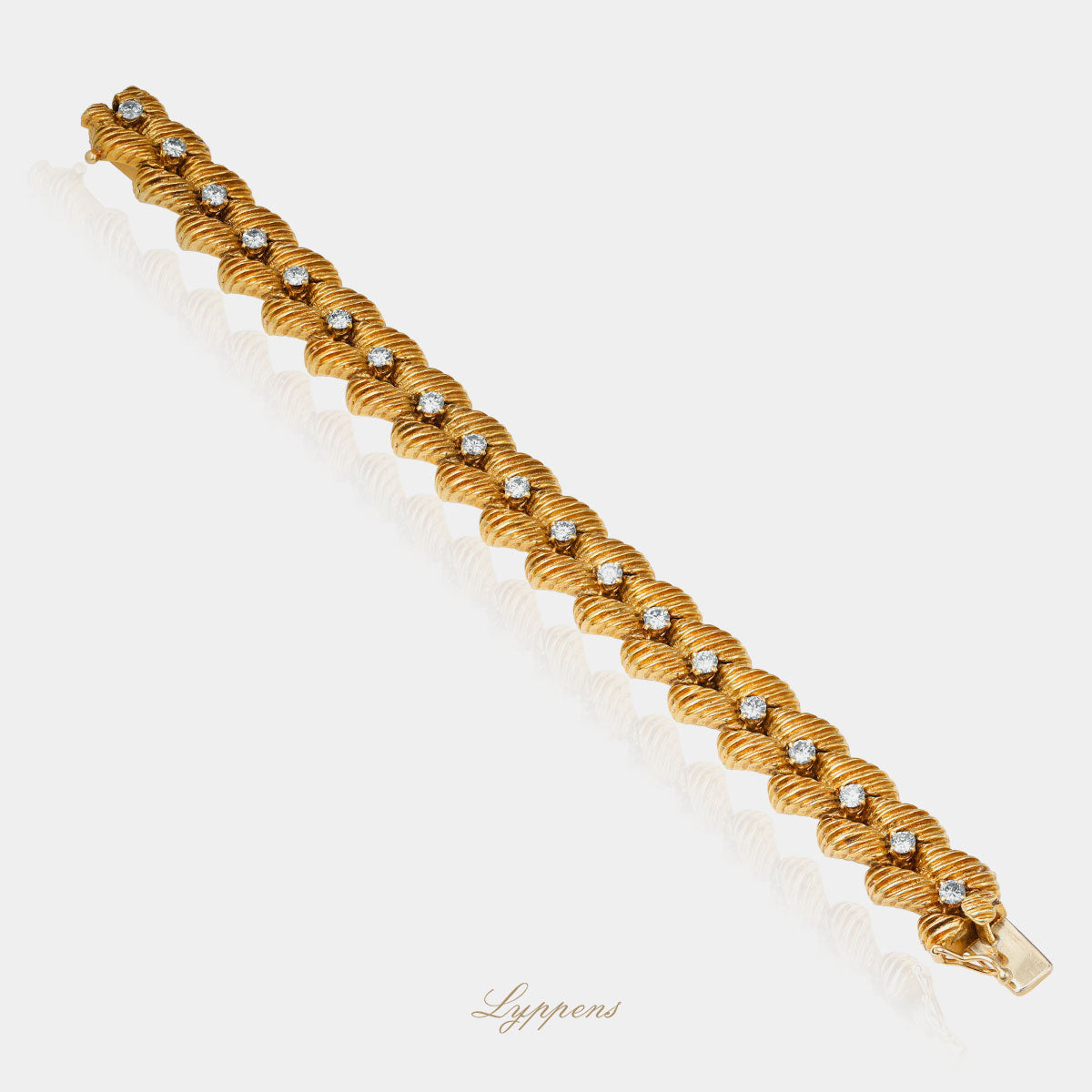 Yellow gold vintage 1960s bracelet with diamonds