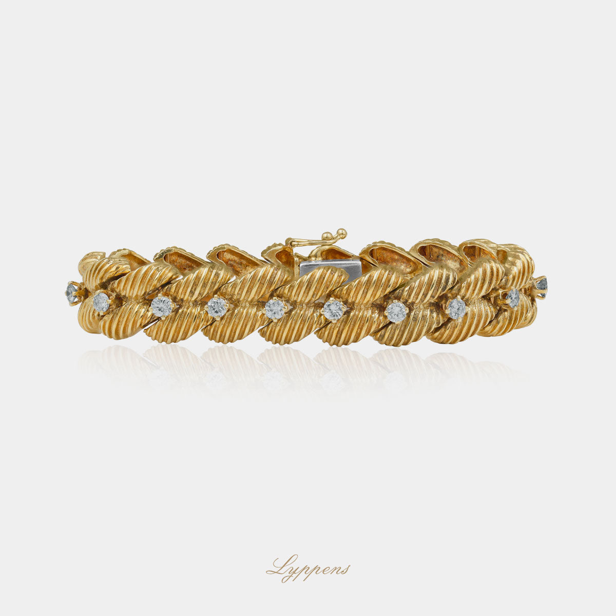 Yellow gold vintage 1960s bracelet with diamonds