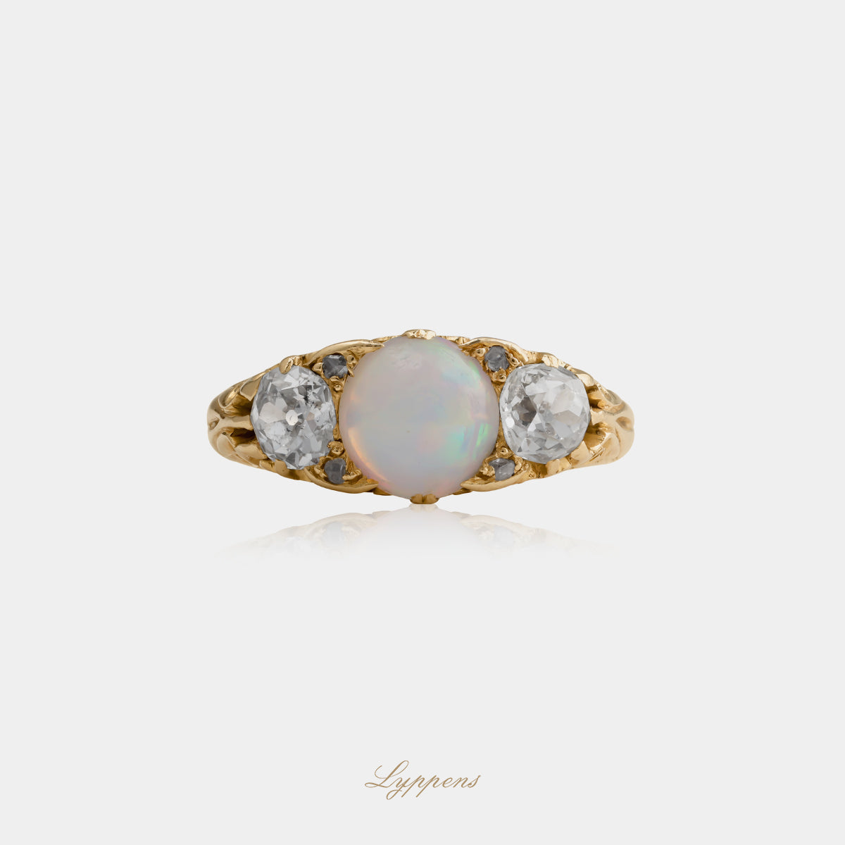 Yellow gold antique ring with opal and diamonds