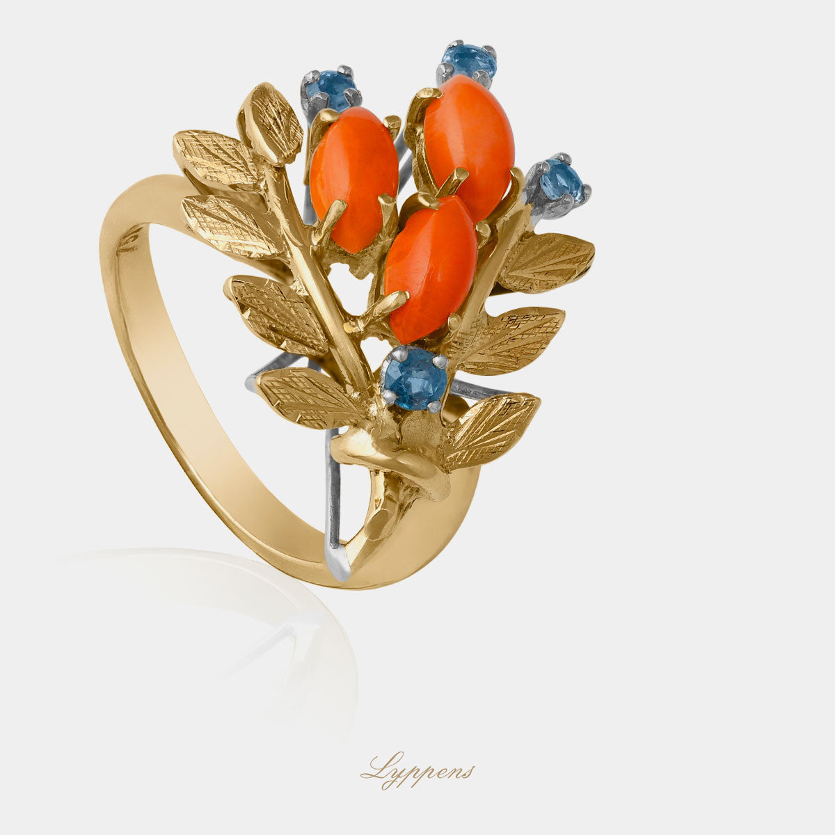 Geelgouden vintage jaren ‘70 ring met koraal en saffier