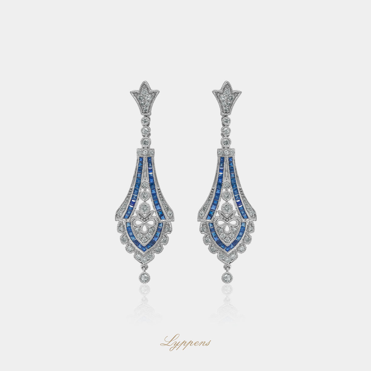 Witgouden vintage oorbellen met saffier en diamant