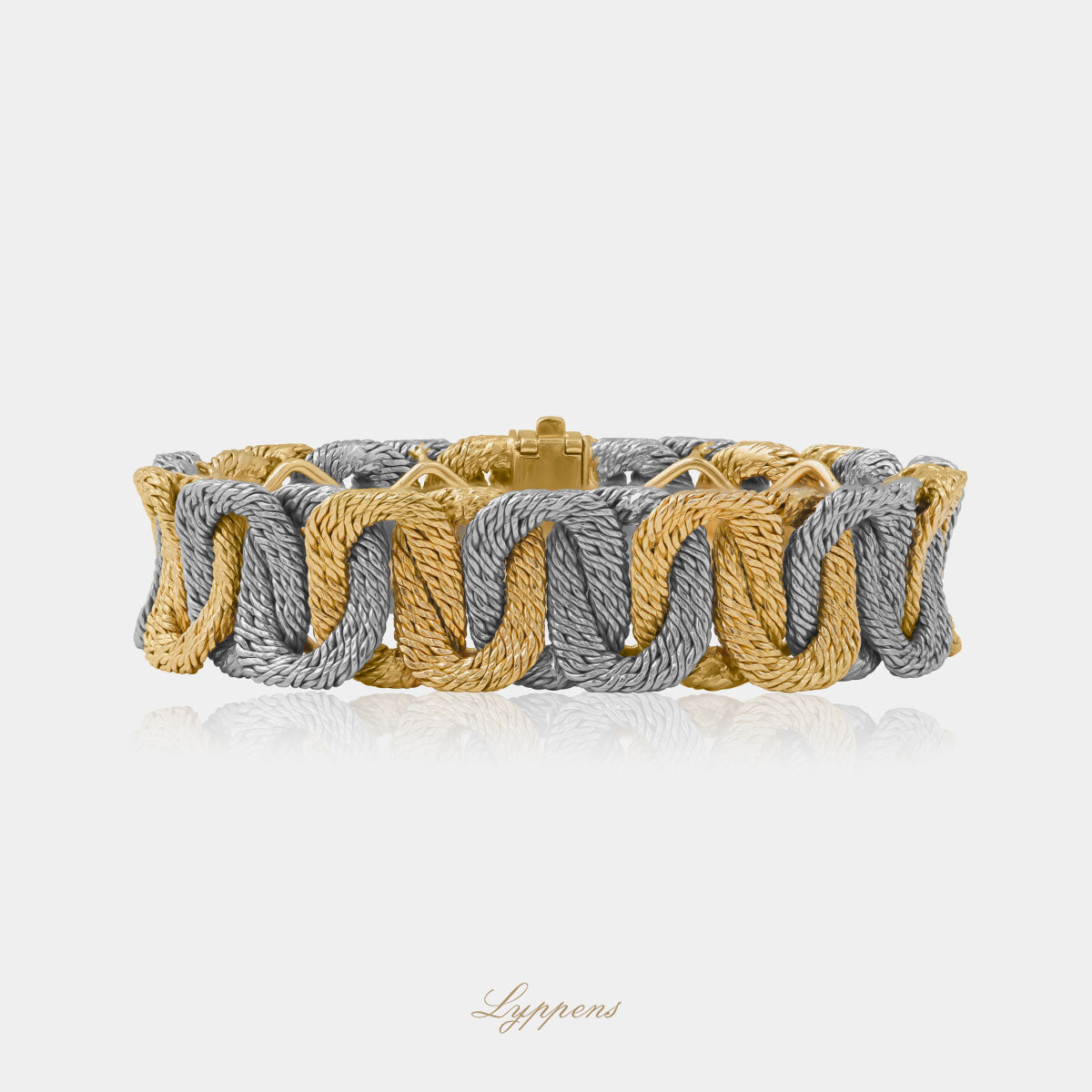 Geel- met witgouden vintage jaren ’70 gevlochten armband van George Lenfant .