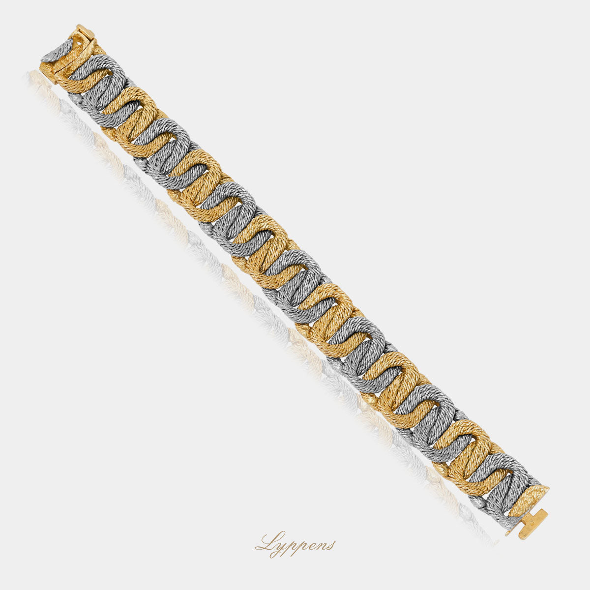 Geel- met witgouden vintage jaren ’70 gevlochten armband van George Lenfant .