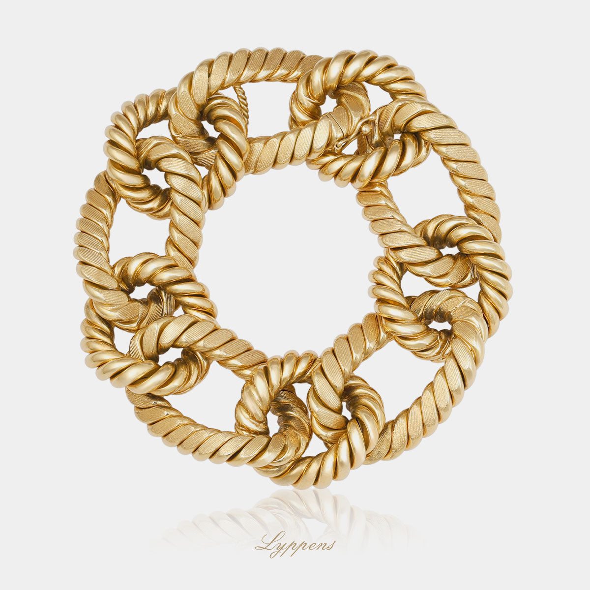 Geelgouden vintage jaren '60 schakelarmband uit italie, opgebouwd uit gouden ovale schakels.