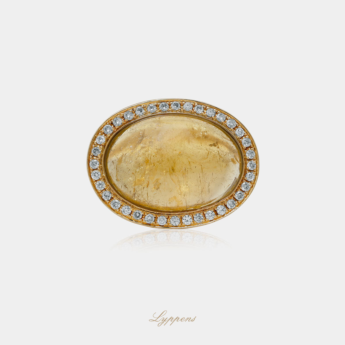 Geelgouden vintage entourage ring met rutielkwarts en diamant