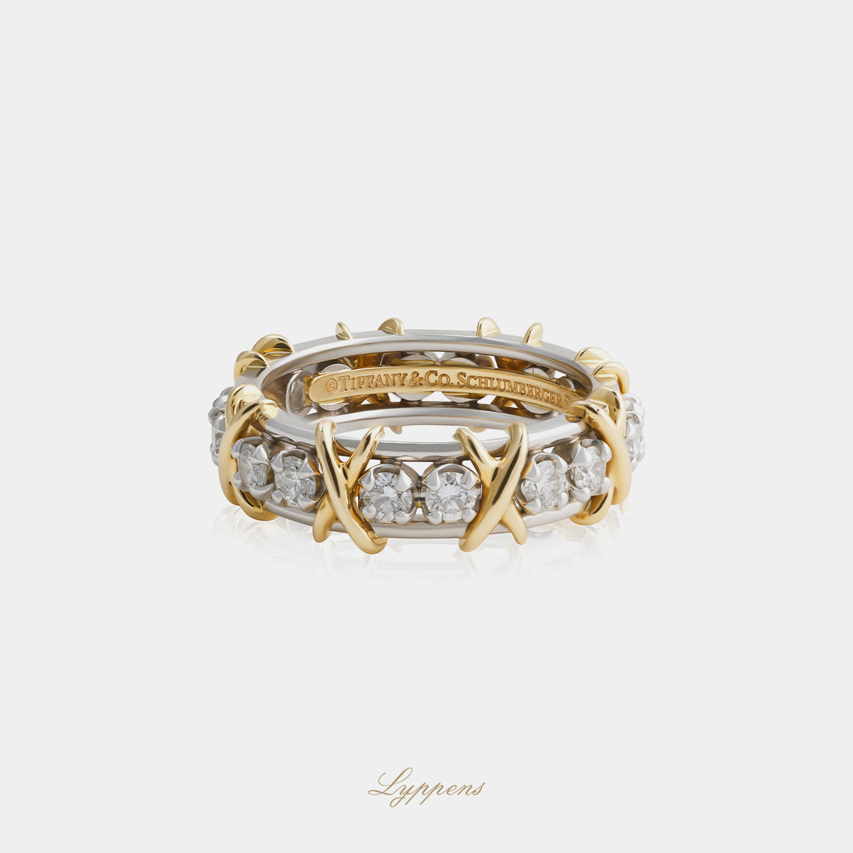 Yellow gold and platinum alliance ring by Tiffany & Co. with diamonds