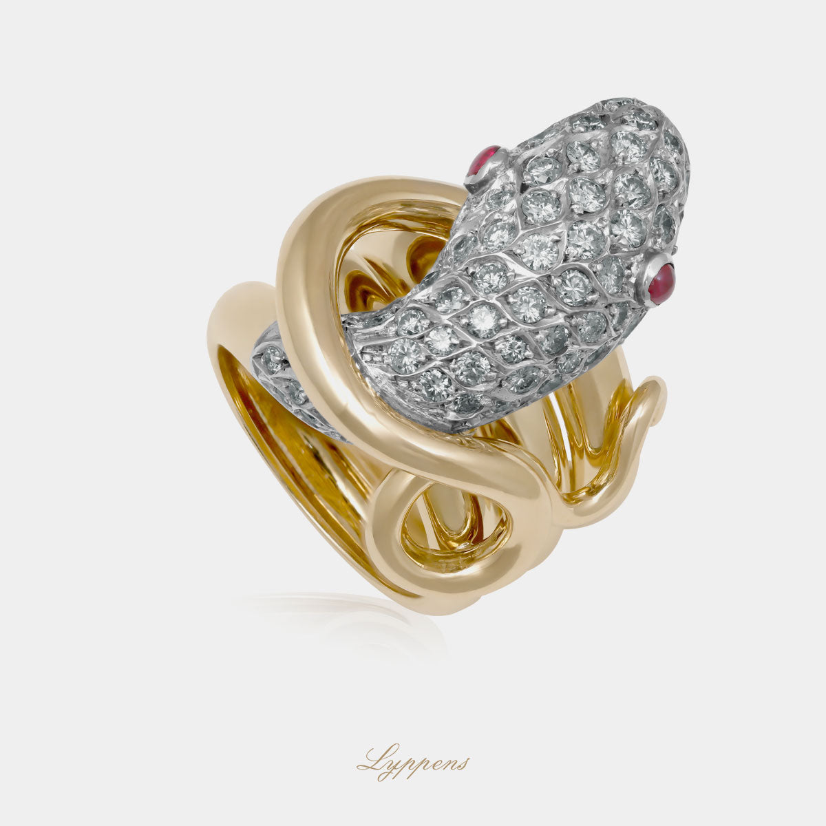 Geelgouden vintage slangen ring met briljant geslepen diamant en robijn.