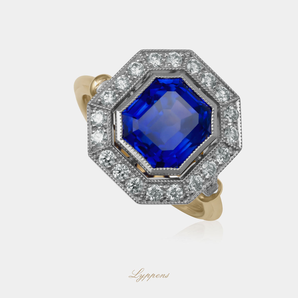 Geel- en witgouden entourage ring met Madagaskar saffier en diamanten