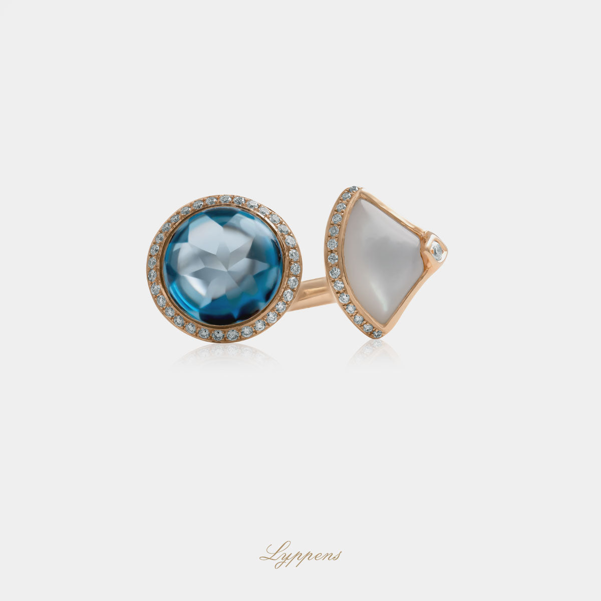 Roségouden slagring met topaas, parelmoer en briljant geslepen diamant.