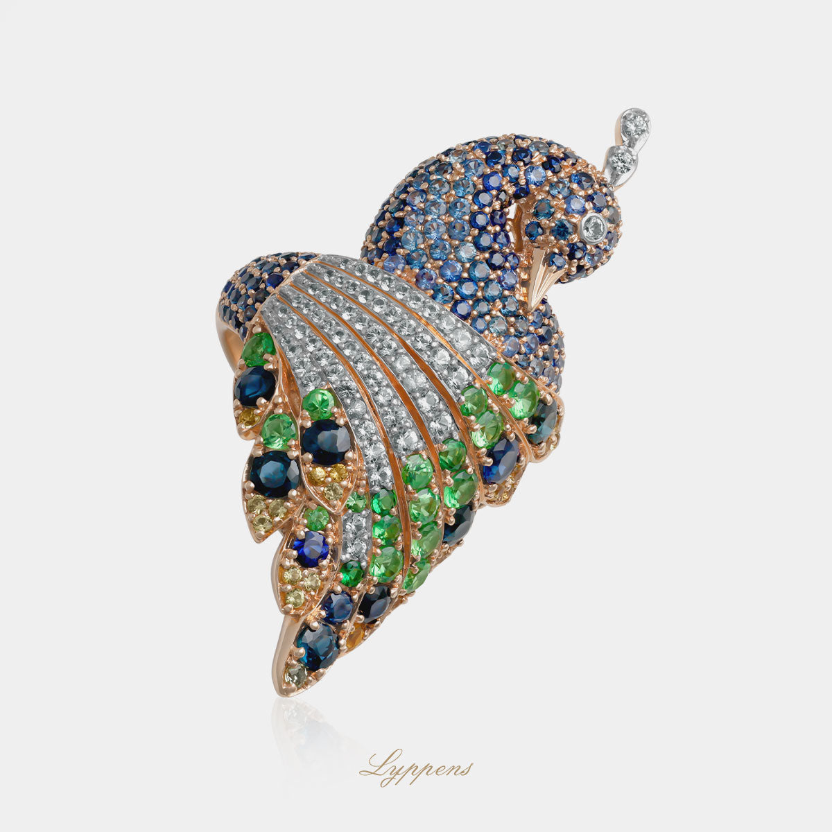 Peacock ring tsavorite and sapphire