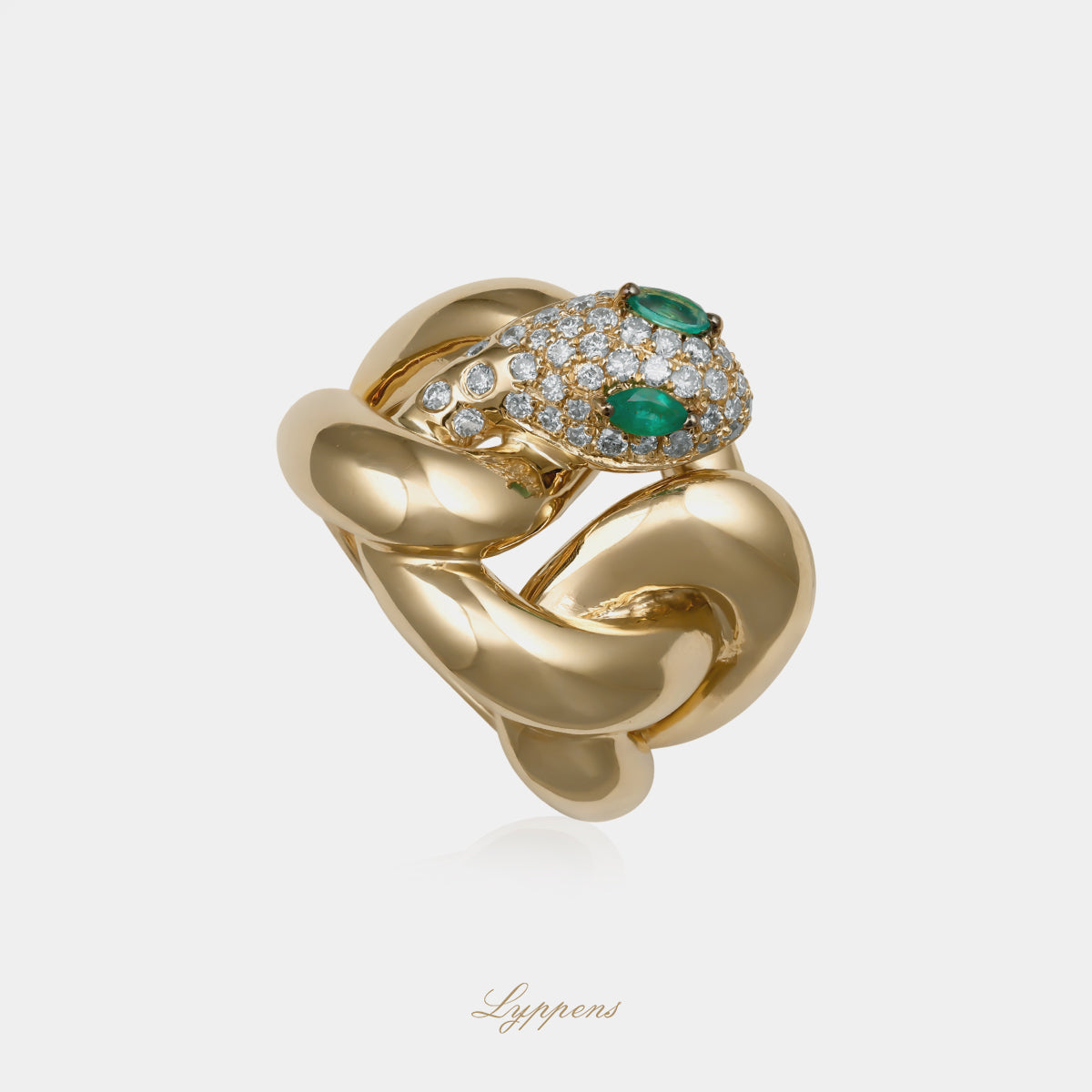 Yellow gold vintage snake ring with emerald and diamonds