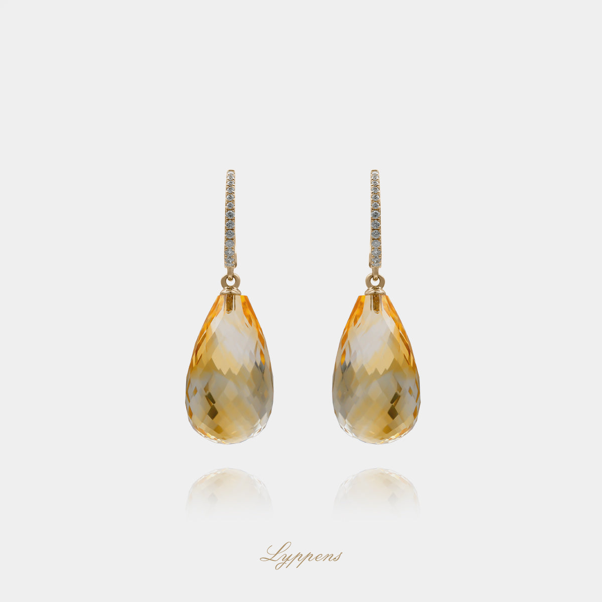 14kt geelgouden oorringen met 0.17ct briljant geslepen diamant en druppelvormige citrien