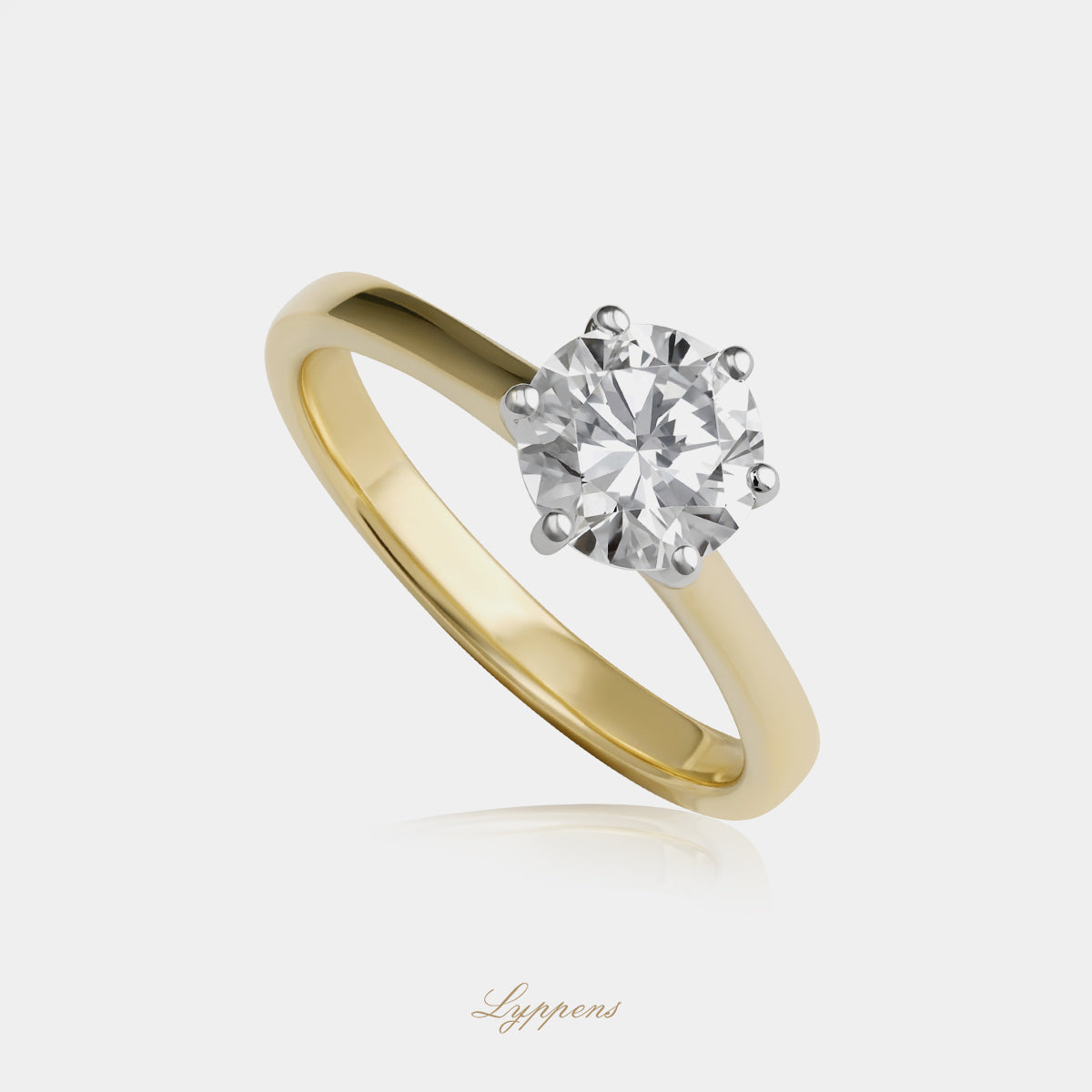 Yellow gold solitaire ring with diamond