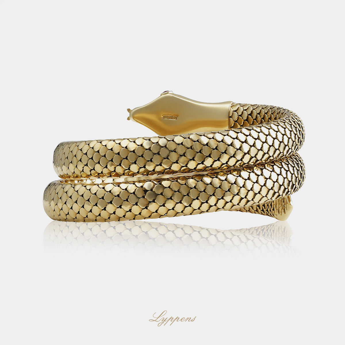 Italiaanse vintage slangenarmband uit de jaren '60 van 18kt geelgoud, handgemaakt met gedetailleerde slangenkop en robijnen ogen