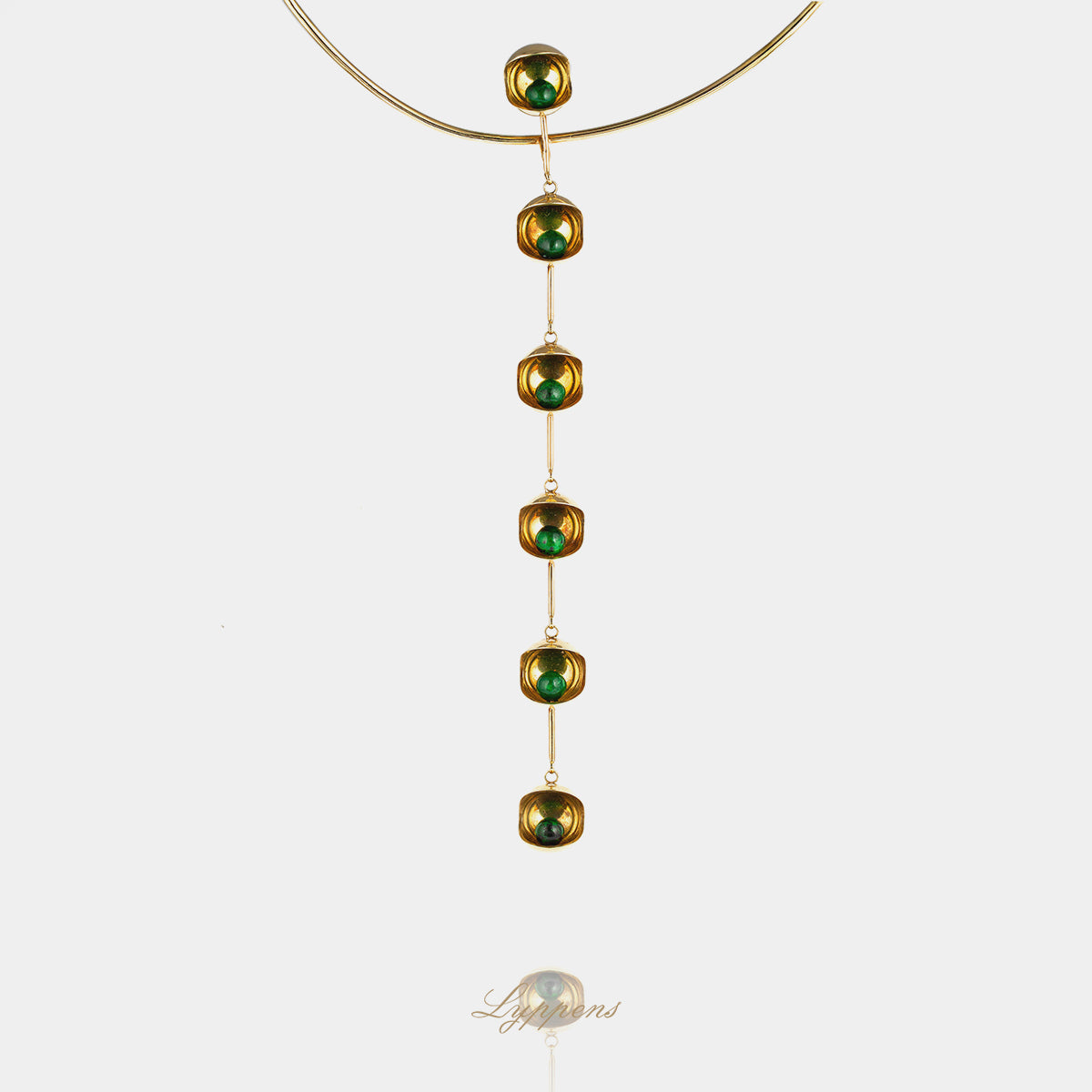 Geelgouden vintage jaren '70 collier met bolvormige malachiet in gouden open bollen