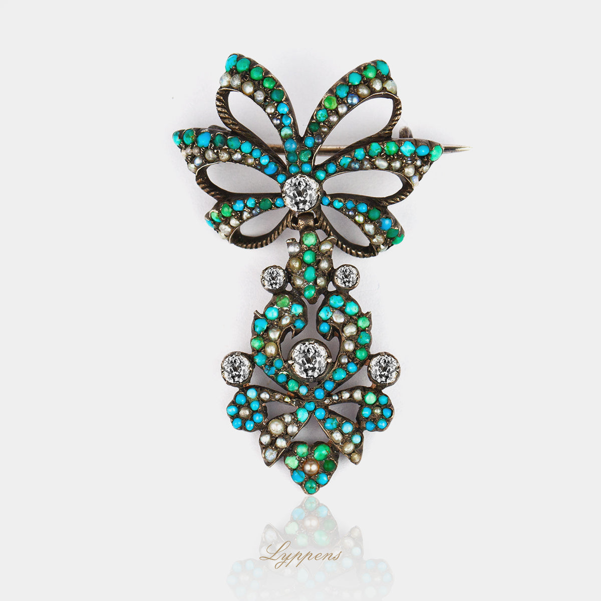 Antieke zilver brooch in de vorm van een stik met zaadparels, turkoois en oud briljant geslepen diamant
