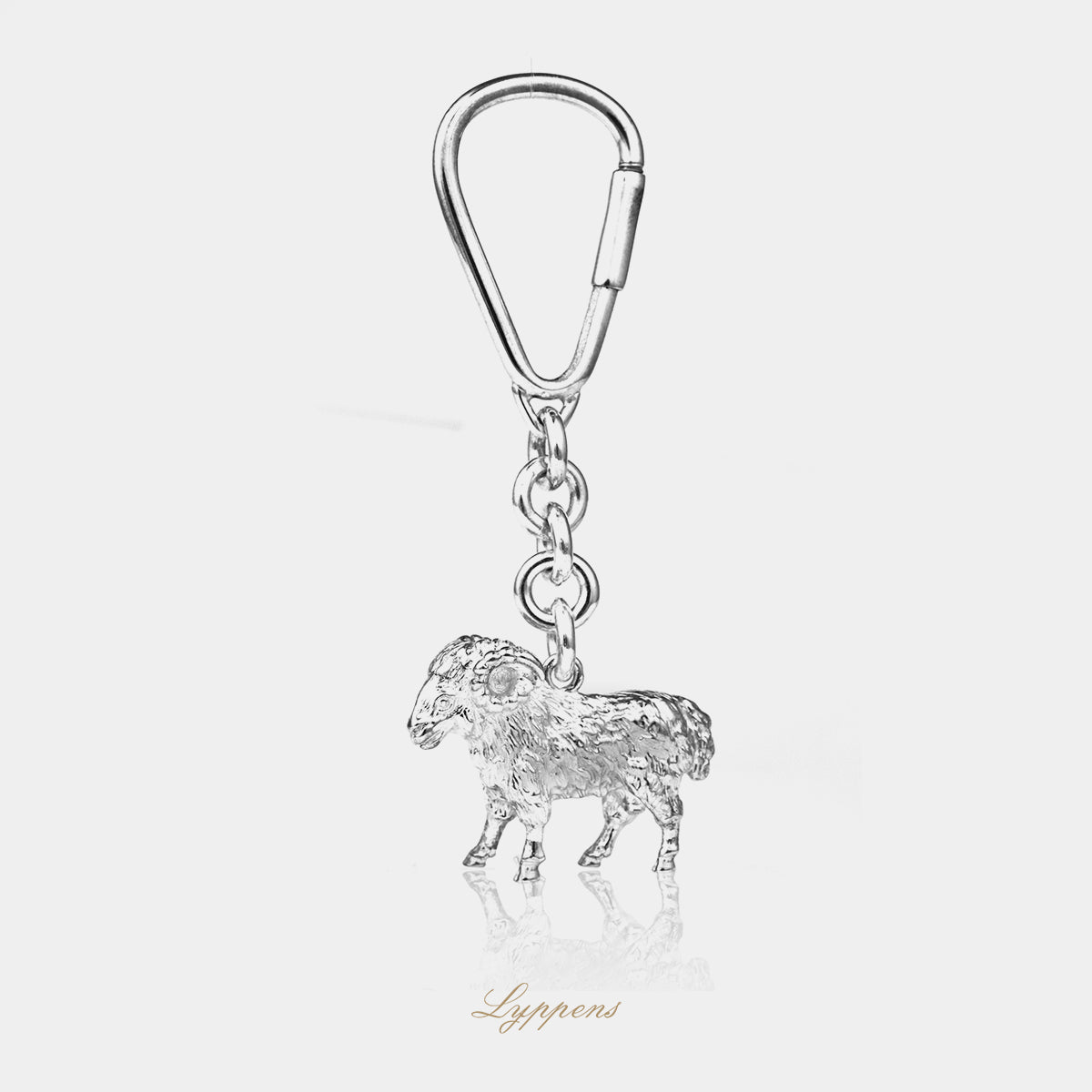 Eerste gehalte zilveren sleutelhanger in de vorm van een ram.