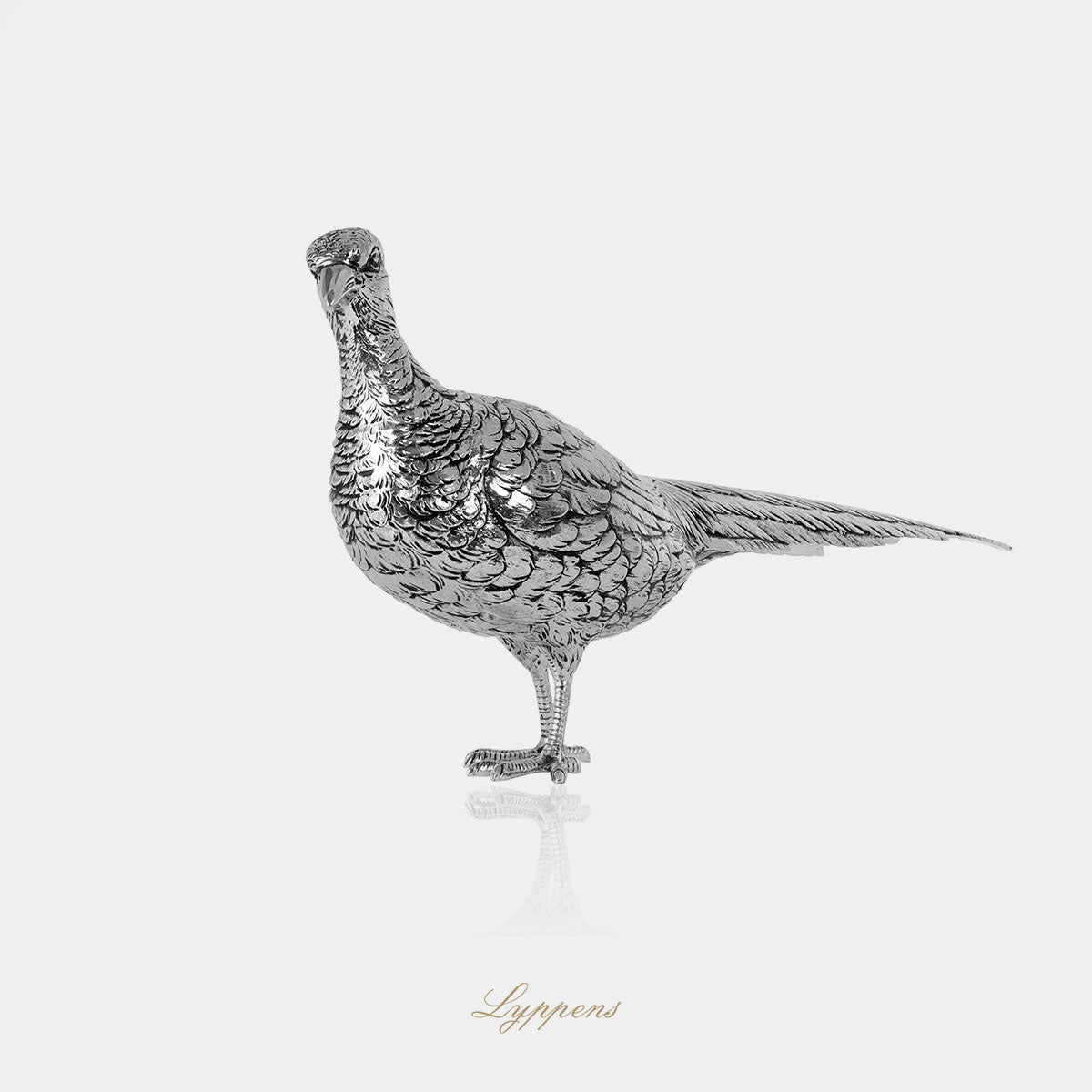 Eerste gehalte zilveren tafelstuk in de vorm van een fazant.