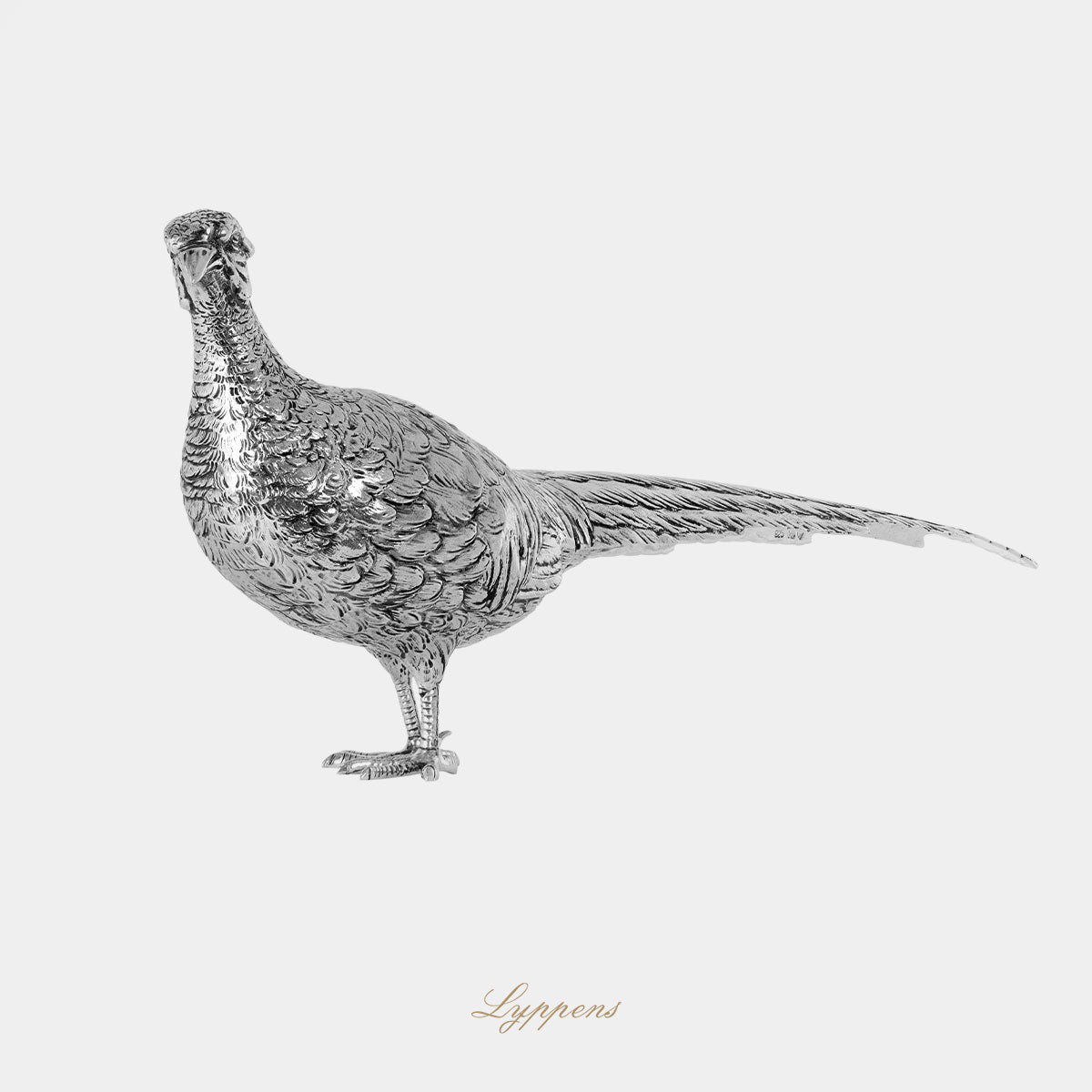 Eerste gehalte zilveren tafelstuk in de vorm van een fazant.