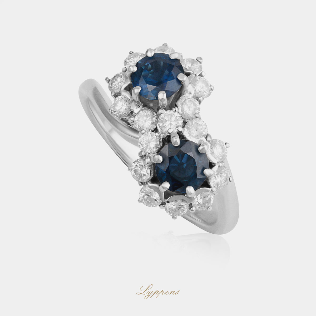 18 karaat witgouden toi et moi ring met rond saffier en briljant diamant halo 0.78ct