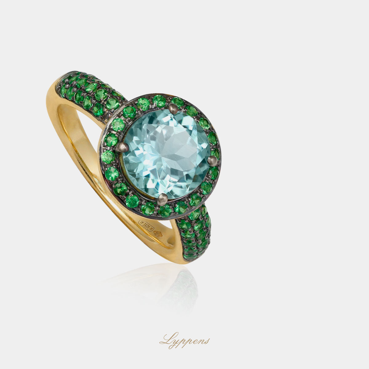 Yellow gold halo ring with tsavorite and tourmaline