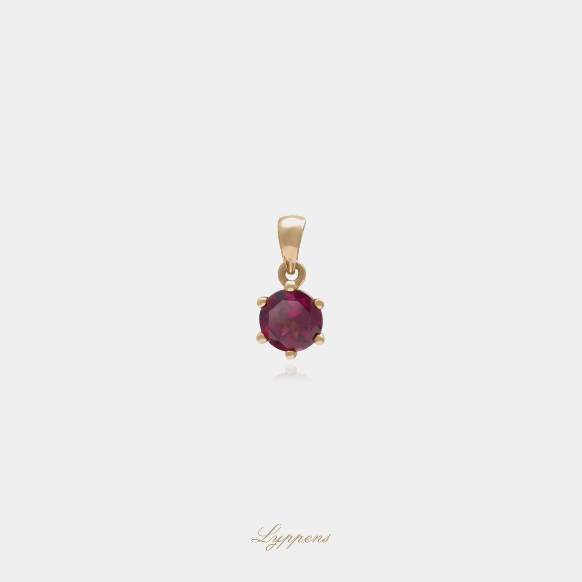 Yellow gold pendant with rhodolite