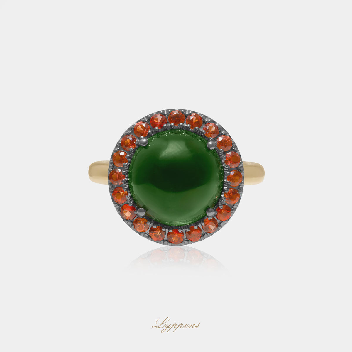 Yellow gold halo ring with red sapphire and tourmaline