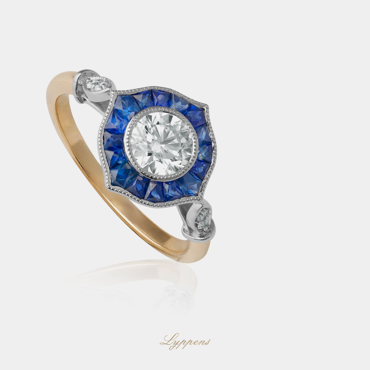 Geel- met witgouden Belle Époque stijl ring met saffier en diamant