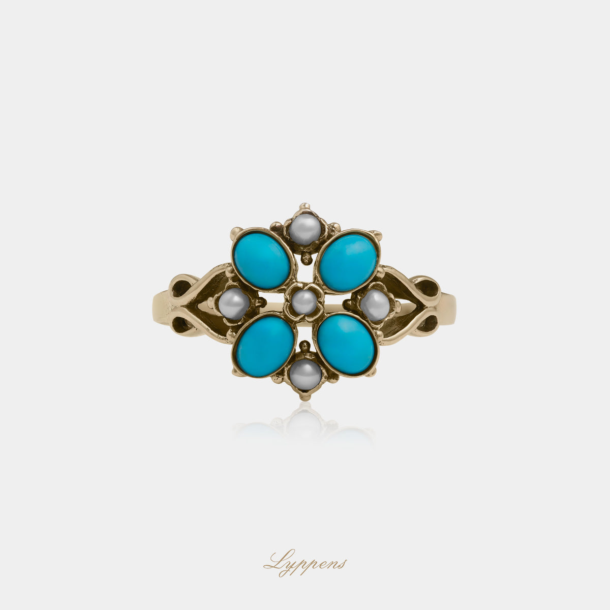 Yellow gold ring with turquoise and pearls