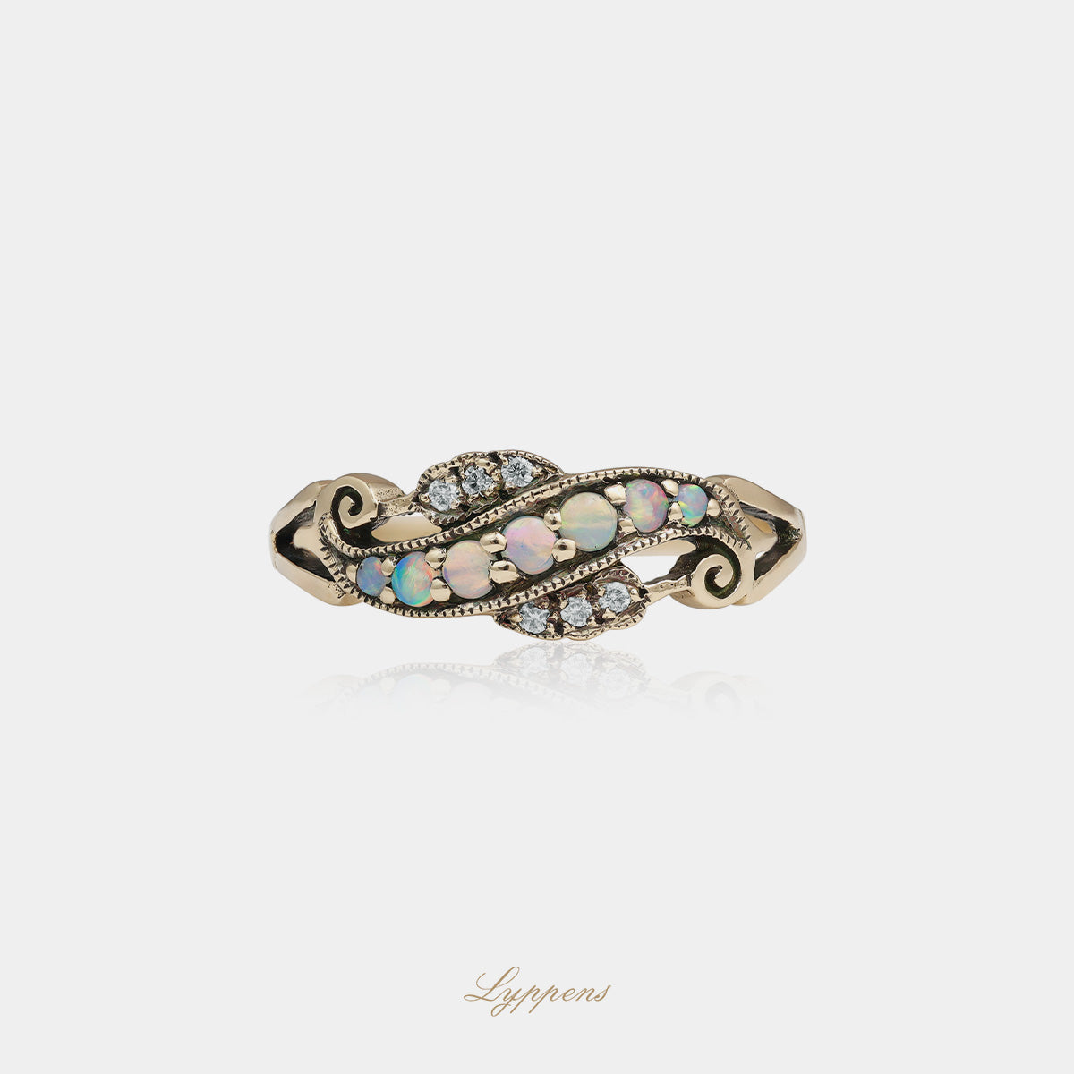 Yellow gold ring with opal and diamonds