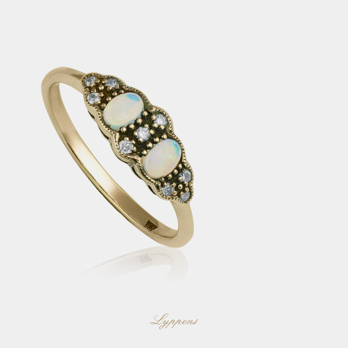 Yellow gold ring with opal and diamonds