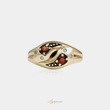 Yellow gold with garnet and diamonds