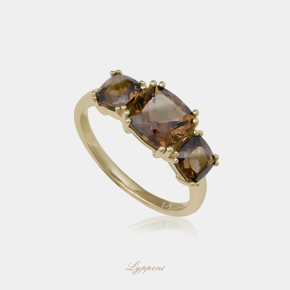 Yellow gold three stone ring with smoky quartz